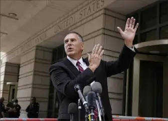  ?? J. Scott Applewhite/Associated Press ?? Patrick Leduc, lawyer for Capitol rioter Paul Allard Hodgkins of Tampa, Fla., speaks to reporters outside the U.S. District Courthouse after Hodgkins was sentenced to eight months behind bars in Washington on Monday.