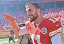  ?? DENNY MEDLEY, USA TODAY SPORTS ?? Quarterbac­k Alex Smith rallied the Chiefs from a 21-point deficit and scored the winning touchdown in overtime.