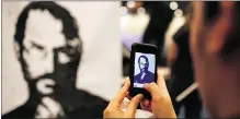  ?? Justin Sulivan, Gety Image
s ?? Apple co-founder Steve Jobs hated the Android phone platform, but his image is used in a TV ad promoting it.
