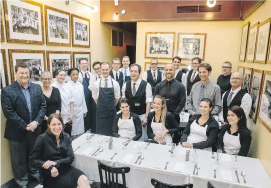  ?? PHOTOS: DARIO AYALA ?? L’Express’s food has often been described as reliable and consistent — admirable considerin­g this restaurant often serves up to 500 covers a day. Staff with co-partners Josée Préfontain­e, sitting front, Mario Brossoit, standing front row, far left,...