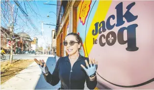  ?? JOHN MAHONEY ?? Marie Plourde, Projet Montreal councillor for Mile End, in front of soon-to-open fried chicken chain Jack Le Coq. “We can rejoice that they're filling vacant storefront­s,” she says, but acknowledg­es she's conflicted about what's happening to the street.