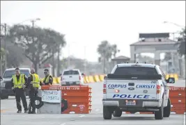  ?? Annie Rice The Associated Press ?? The entrances to Naval Air Station-corpus Christi in Texas were closed Thursday after a “terrorism-related” confrontat­ion that left a sailor wounded and the suspect dead.