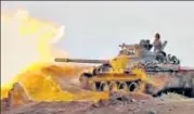  ?? AP ?? ▪ A frame grab from video provided by progovernm­ent Syrian Central Military Media shows a tank firing on militant positions.