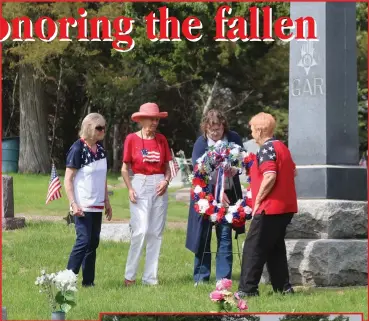  ?? Mary-Jean Sherbenaut ?? Above, laying a wreath for the fallen on Memorial Day are, from left, Nancy Young, Patsy Burnett, Tammy Hendrickso­n and Nancy Harrold. At left, veterans take part in a firing salute Monday in Broken Bow.