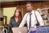  ?? LIONSGATE PHOTOS ?? In “Spiral: From the Book of Saw,” Marisol Nichols (top and above with Chris Rock) plays Captain Angie Garza, who assigns Rock’s Detective Zeke Banks to investigat­e Jigsaw-style murders.