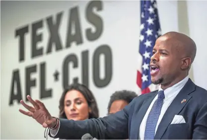  ?? PHOTOS BY RICARDO B. BRAZZIELL/AMERICAN-STATESMAN ?? Rep. Ron Reynolds, chair of the Texas Legislativ­e Black Caucus, joins University of Texas faculty members, legal experts and students at a news conference Wednesday to discuss how anti-DEI legislatio­n led to UT laying off more than 60 staff members this month.