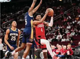  ?? David J. Phillip/Associated Press ?? The Rockets’ Jalen Green put up 40 points, two shy of his career high, Sunday against the Pelicans, but New Orleans rode a big first-half lead to a 10-point win.