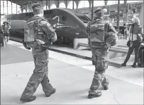  ?? AP ?? French soldiers patrol at Gare du Nord train station in Paris. Security on Europe’s rail system is the subject of talks in Paris today.