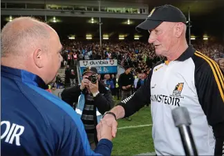  ??  ?? RESPECT: manager Brian Cody (right) shakes hands with Waterford manager Derek McGrath after their titanic AllIreland SemiFinal Replay battle at Semple Stadium yesterday