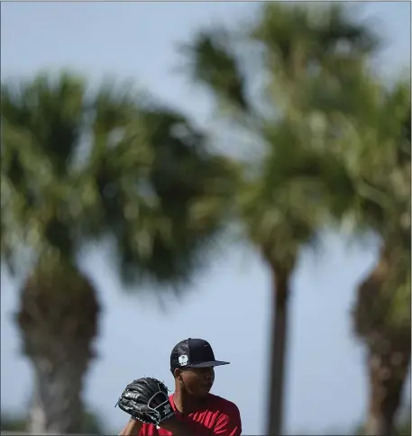  ?? BRYNN ANDERSON — THE ASSOCIATED PRESS ?? Boston Red Sox starting pitcher Brayan Bello warms up during a spring training baseball practice on Friday, Feb. 17, 2023, in Fort Myers, Fla.
