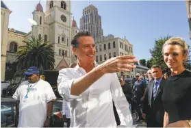 ?? Amy Osborne / Special to The Chronicle ?? Gov.-elect Gavin Newsom and wife Jennifer Siebel Newsom (right) earned more than $900,000 from companies they owned, according to their 2016 tax returns.