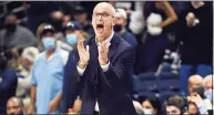  ?? Jessica Hill / Associated Press ?? UConn coach Dan Hurley reacts during a game against CCSU earlier this season. The coach said he’s hopeful the Huskies can return to the court in time for its Jan. 8 game against Seton Hall.