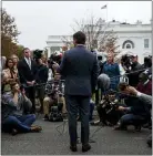  ?? EVAN VUCCI — THE ASSOCIATED PRESS ?? White House deputy press secretary Hogan Gidley talks with reporters outside the White House, Tuesday in Washington.