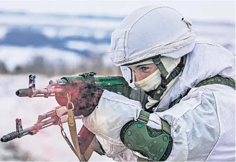  ?? ?? A Russian soldier takes part in exercises in the region of Voronezh, east of the border with Ukraine, where more than 100,000 troops are massed