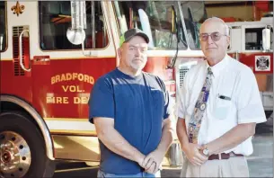  ?? STACI VANDAGRIFF/THREE RIVERS EDITION ?? Bradford Volunteer Fire Department members Dennis Whitener, left, and Bill Fies were honored by the department during a banquet in December. Whitener, who was fire chief and is now Bradford’s mayor, was named Firefighte­r of the Year. Fies, who is the principal at Trinity Christian School in Bradford, was named First Responder of the Year.