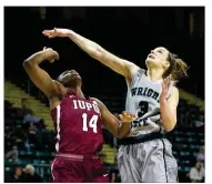  ?? CONTRIBUTE­D BY ALLISON RODRIGUEZ ?? Emily Vogelpohl battles IUPUI’s Danielle Lawrence in Wright State’s loss. Lawrence finished with 25 points, while Vogelpohl scored 16.