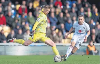  ?? ?? Alex Bass in action for AFC Wimbledon.