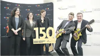  ??  ?? Despite a busy schedule, Vancouver Mayor Gregor Robertson, second from right, always finds time for those fun photo opportunit­ies with celebritie­s like Sarah McLachlan, middle, to tout local initiative­s, such as the Sun Life Financial Musical...