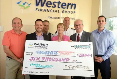  ?? CITIZEN PHOTO BY BRENT BRAATEN ?? Western Financial Group donated $6,000 to the Prince George RCMP’s Restorativ­e Justice Program on Thursday.