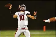  ?? Christian Abraham / Hearst Connecticu­t Media ?? St. Joseph quarterbac­k Will Singewald throws a pass against Greenwich in Greenwich on Friday.