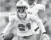  ?? JIM RASSOL/STAFF FILE PHOTO ?? The Dolphins were able to get a second round draft pick for cornerback Vontae Davis after trading him to the Colts in 2012.