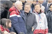  ??  ?? WARMING UP: United States’ Vice-President Mike Pence and South Korean President Moon Jae-in the Gangneung Ice Arena on Feb 10.