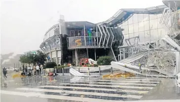  ?? / TWITTER ?? Strong winds and rain caused massive damage to Cradleston­e Mall in Krugersdor­p on Johannesbu­rg’s West Rand yesterday afternoon.
