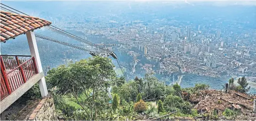  ?? TONY BOSSE DREAMSTIME ?? Bogota, seen here from the Monserrat Mountain, is called the Athens of South America. Colombia has coastlines on both the Pacific Ocean and the Caribbean Sea.