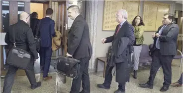  ?? AndrEW VauGhan / thE CanadIan PrEss ?? Interested parties head into Nova Scotia Supreme Court last week in the QuadrigaCX case. A judge is expected to decide Thursday who will represent the creditors.