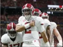  ?? JOHN BAZEMORE — THE ASSOCIATED PRESS ?? Alabama quarterbac­k Jalen Hurts (2) celebrates his touchdown against Georgia during the second half Saturday in Atlanta.