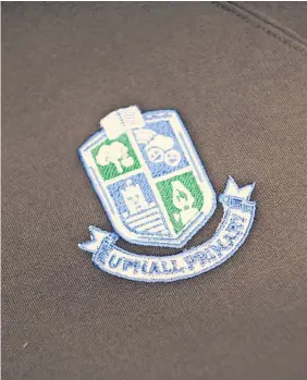  ?? ?? Badge of honour Education inspectors have praised Uphall Primary staff