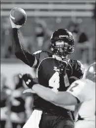  ?? Special to the Democrat-Gazette/JIMMY JONES ?? Charleston quarterbac­k Ty Storey passed for 378 yards and six touchdowns, which tied the record for a state championsh­ip game.