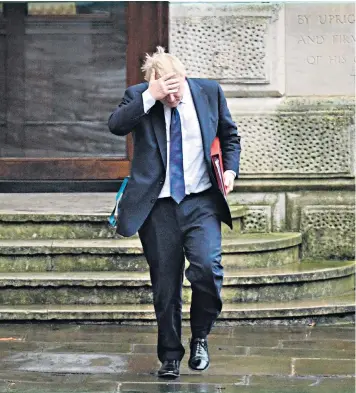  ??  ?? Boris Johnson, the Foreign Secretary, on his way to 10 Downing Street for yesterday’s Cabinet meeting