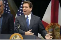  ?? JOHN RAOUX — THE ASSOCIATED PRESS ?? Florida Gov. Ron Desantis speaks at a news conference Monday in Lake Buena Vista, Fla. His Disney World governing body appointees look to make major changes in planning at the amusement park.