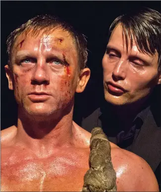  ??  ?? SHAKEN NOT STIRRED: Daniel Craig and Mads Mikkelsen in the Casino Royale scene