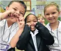  ?? Picture: EUGENE COETZEE ?? GAPPY GRINS: Kabega Park Primary pupils, from left, Jayden van Schalkwyk, 6, Vuyizama May, 6, Morgan Tate, 7, and Cassidy de Beer, 6, show off where they lost teeth during the past holidays