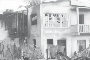  ??  ?? The burnt remains of the Hetsberger family’s house