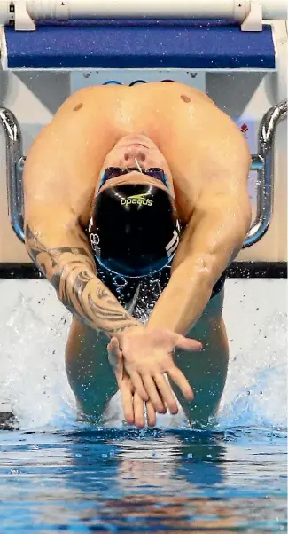  ?? DAVID GRAY ?? Corey Main competes at the Rio Olympics last year. He is one of New Zealand’s few world-class swimmers.