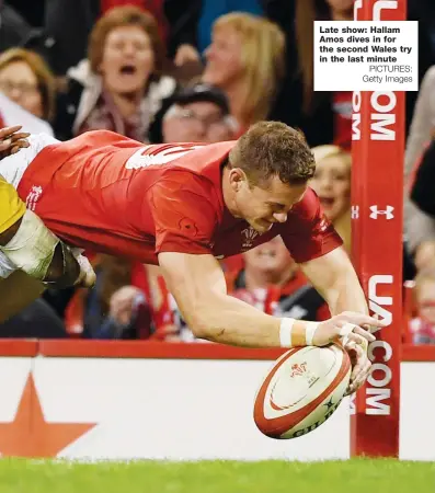  ?? PICTURES: Getty Images ?? Late show: Hallam Amos dives in for the second Wales try in the last minute