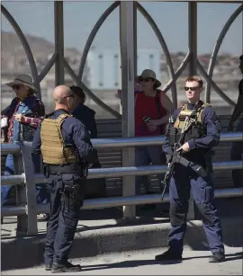  ?? THE ASSOCIATED PRESS ?? The U.S. government on Friday said it is sending active duty personnel to two official border crossings to deal with asylum-seekers in case a federal appeals court strikes down one of the Trump administra­tion’s key policies.