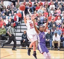  ??  ?? Sonoravill­e’s Abby Chambers elevates over a defender during the team’s state playoff win. Chambers was a huge factor for the Lady Phoenix.