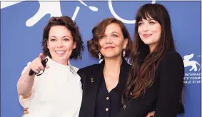  ?? Domenico Stinellis / Associated Press ?? From left, Olivia Colman, Maggie Gyllenhaal and Dakota Johnson at the photo call for the film “The Lost Daughter” during the 78th edition of the Venice Film Festival.