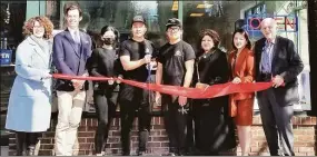  ?? Middlesex County Chamber of Commerce / Contribute­d photo ?? M Town Wings in Middletown celebrated its grand opening March 3. From left are Sandra Russo-Driska, Downtown Business District coordinato­r; Mayor Ben Florsheim, Vicky Zhu, owner William Chen, John Li, Central Business Bureau Chairwoman Pam Steele, Ling Lin, owner of Moonlight Sushi Bar; and chamber President Larry McHugh.