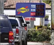  ?? MARTA LAVANDIER/AP FILE PHOTO ?? Just as Americans gear up for summer road trips, the price of oil remains stubbornly high, pushing prices at the gas pump to painful heights. On May 10, AAA said drivers are paying $4.37 for a gallon of regular gasoline.