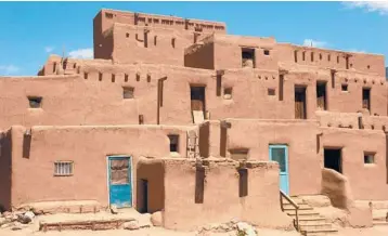  ?? DREAMSTIME ?? Taos, New Mexico, is loaded with active outdoor adventures, culture and history, including the must-see Taos Pueblo, an impressive UNESCO World Heritage site composed of multistory adobe buildings.