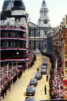  ??  ?? Huge crowds lined the route to St Paul’s cathedral. Right: Diana and her bridesmaid­s get ready, watched by the Queen. Diana’s dress proved a sensation.