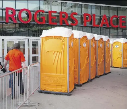  ?? DAVID BLOOM/FILES ?? Portable toilets have been installed to accommodat­e the foot traffic around Rogers Place.