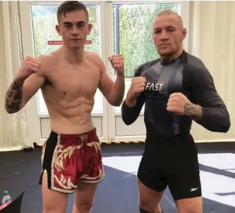  ??  ?? Tralee kickboxer Dara O’Sullivan pictured here with MMA star Conor McGregor, who Dara has been helping for the Dubliner’s bout with Dustin Poirier on January 24.
