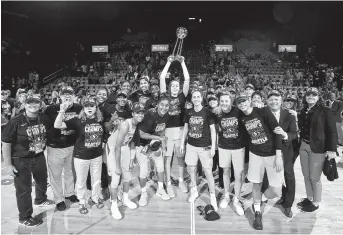  ??  ?? Seattle Storm players pose for a team photo after winning the WNBA Finals by beating the Washington Mystics 98-82 at Eaglebank Arena at George Mason University in Fairfax, Virginia, for a 3-game sweep. Forward Breanna Stewart, holding the trophy, was named the finals MVP. It was Seattle’s third WNBA championsh­ip. — Reuters