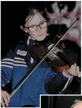  ??  ?? ABOVE: Ava Thornton, from Millstreet, playing mighty tunes on the fidldle at the Cullen Culture Night.